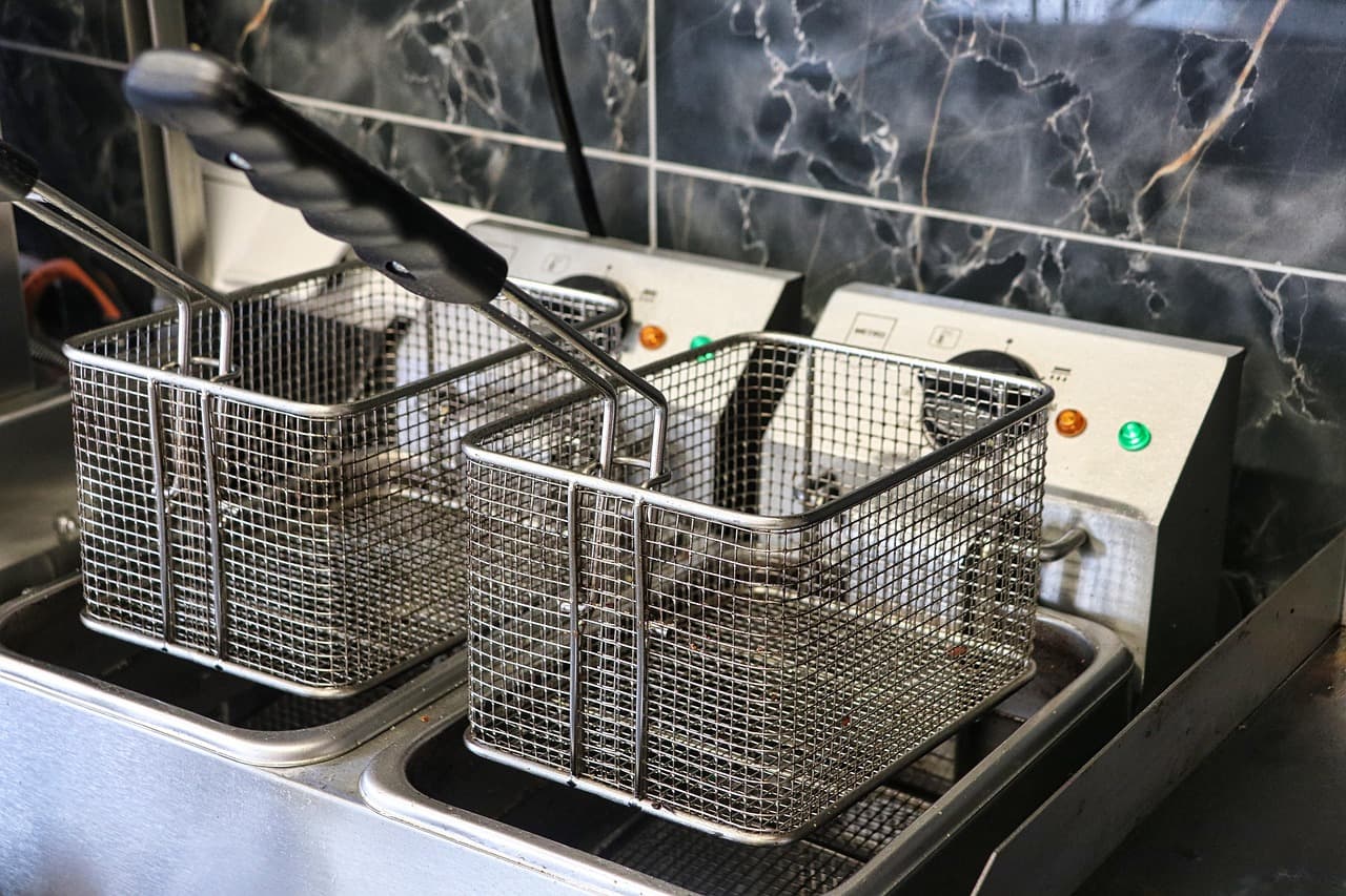 Commercial kitchen with stainless steel equipment
